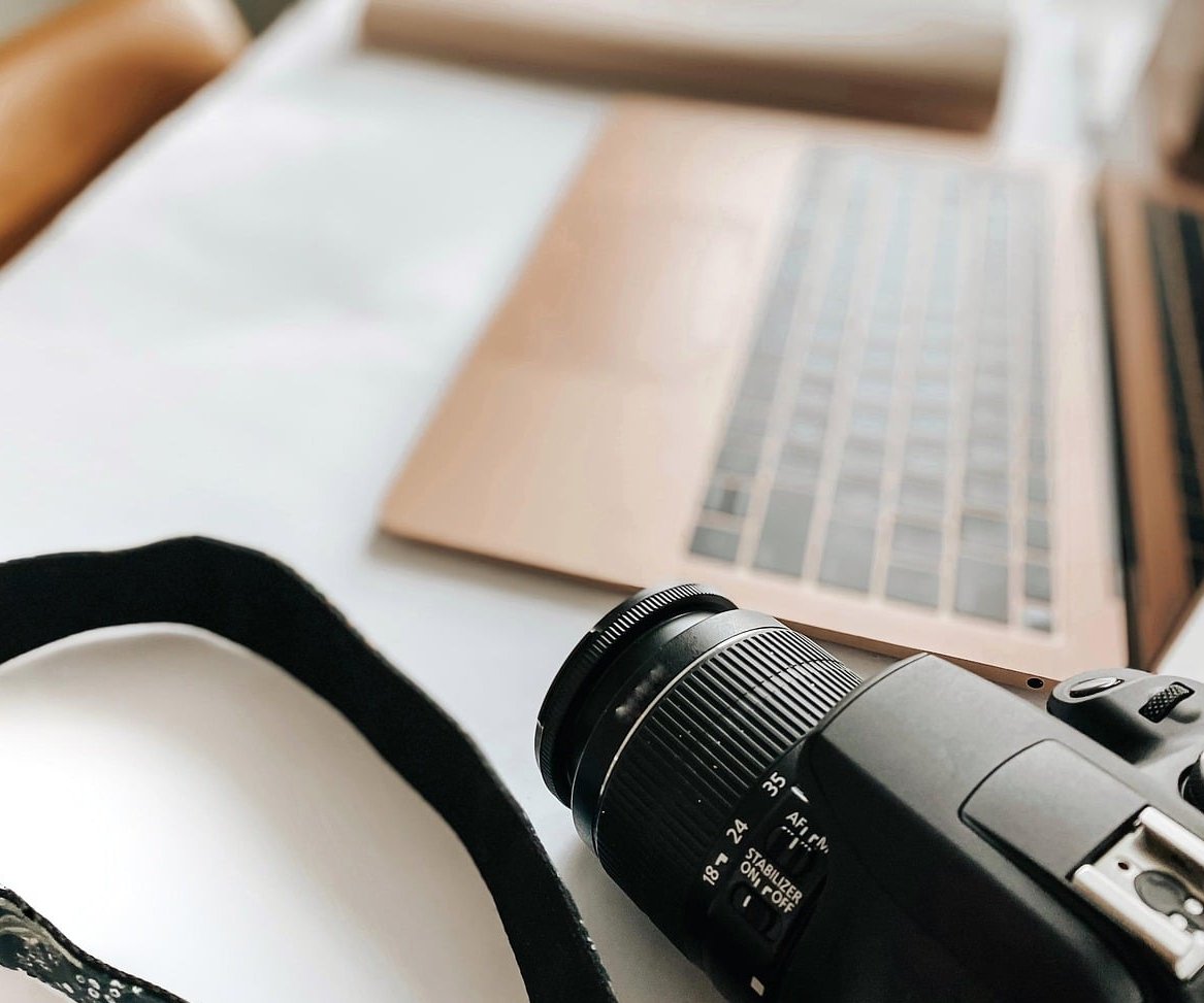 photographer with camera working